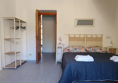 Letto o letti in una camera di Affittacamere Alisso
