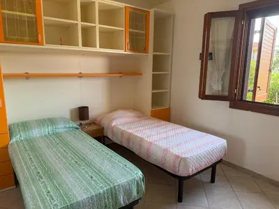 Letto o letti in una camera di Villa Maria