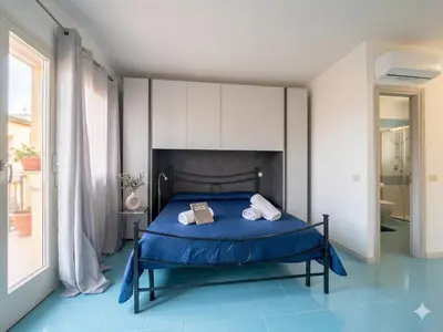 Letto o letti in una camera di Vignola Home