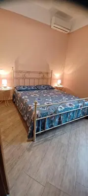 Letto o letti in una camera di Rosa's Flat