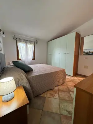 Letto o letti in una camera di Villa Scirocco