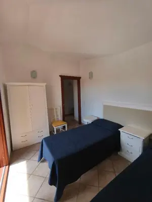 Letto o letti in una camera di Residenza Le Lantane