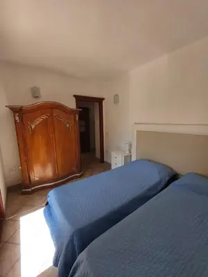 Letto o letti in una camera di Residenza Le Lantane