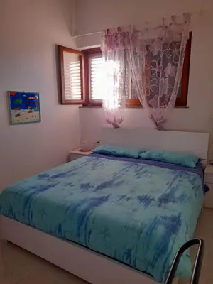 Letto o letti in una camera di Vacation Home in San Teodoro