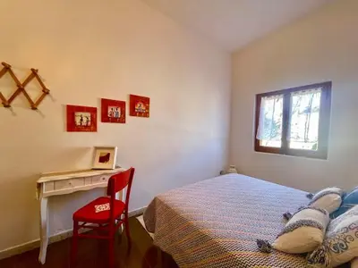 Letto o letti in una camera di Casa Bellavista