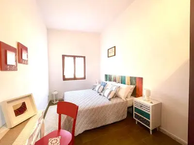 Letto o letti in una camera di Casa Bellavista