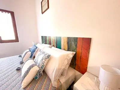 Letto o letti in una camera di Casa Bellavista