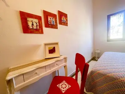 Letto o letti in una camera di Casa Bellavista