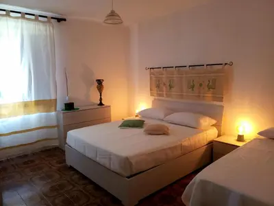 Letto o letti in una camera di CASA VACANZE SARDEGNA in Gallura 1KM dal mare
