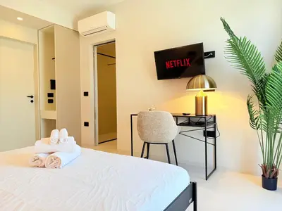 Letto o letti in una camera di I Nidi di Dommos - Camere nel centro storico di Orosei