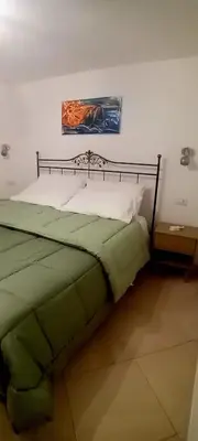 Letto o letti in una camera di Casa Paola