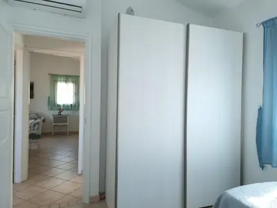 Letto o letti in una camera di Residenza Monte Rena - Rena A3 - Budoni Sweet Home