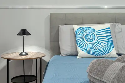Letto o letti in una camera di House with Private Garden Near City Centre and Beach