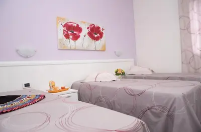 Letto o letti in una camera di Affittacamere Meta Mito