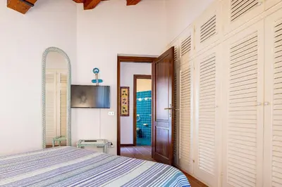 Letto o letti in una camera di Villa Silènis