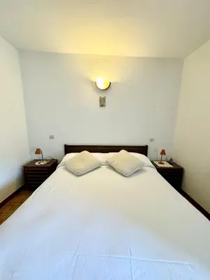 Letto o letti in una camera di Trilocale L&L San Teodoro