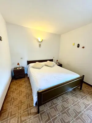 Letto o letti in una camera di Trilocale L&L San Teodoro