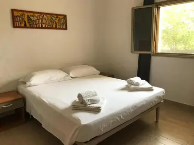 Letto o letti in una camera di Oasi di Pace apartment