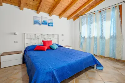 Letto o letti in una camera di Anna Bay