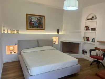 Letto o letti in una camera di L 'alchitti