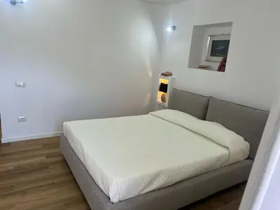Letto o letti in una camera di L 'alchitti