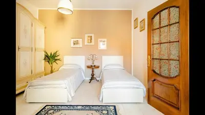 Letto o letti in una camera di B&B Maison Rosetta IUN-E4948