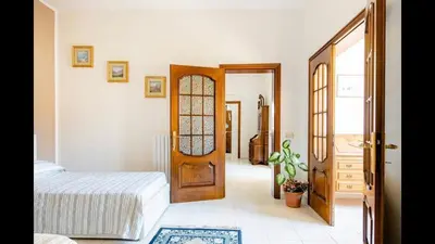 Letto o letti in una camera di B&B Maison Rosetta IUN-E4948