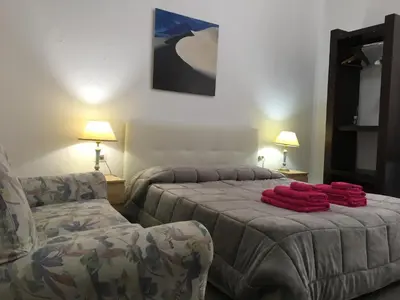 Letto o letti in una camera di B&B Maison Rosetta IUN-E4948