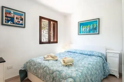 Letto o letti in una camera di Casa Nani mare