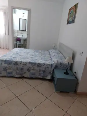 Letto o letti in una camera di B&B Mes' Agustu