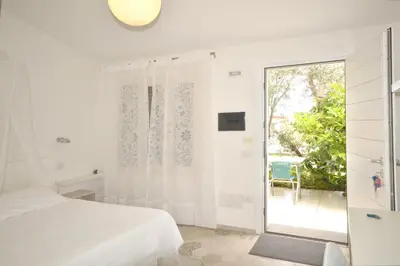 Letto o letti in una camera di MURISKA - Sa Petra Ruja