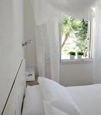 Letto o letti in una camera di MURISKA - Sa Petra Ruja