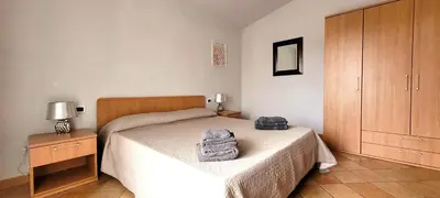 Letto o letti in una camera di Casa Nala - Villa con giardino