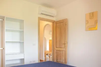 Letto o letti in una camera di Bilocale tra terra e mare