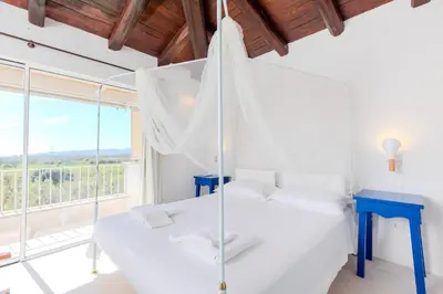 Letto o letti in una camera di Casa Luce