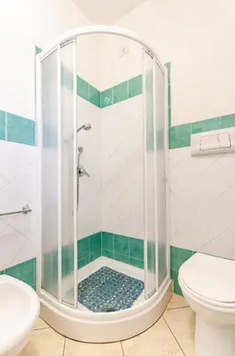 Bagno di Appartamento Pina Caletta sul mare