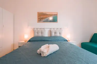 Letto o letti in una camera di Giobo Mare