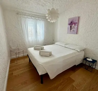 Letto o letti in una camera di Boutique Art W9