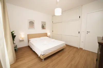 Letto o letti in una camera di Casa Rosy