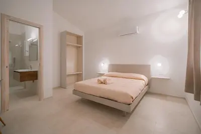 Letto o letti in una camera di Affittacamere Avedí