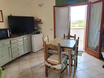 Cucina o angolo cottura di Villetta Vacanze Budoni