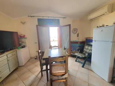 Cucina o angolo cottura di Villetta Vacanze Budoni