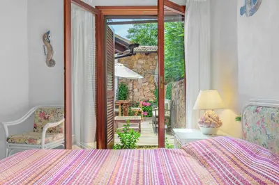 Letto o letti in una camera di Villa Silnis -Puntaldia