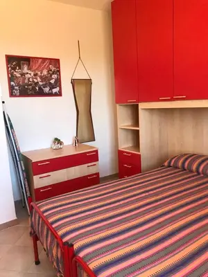 Letto o letti in una camera di Il mirto in fiore