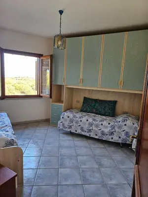 Letto o letti in una camera di Casa Corallo
