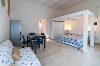 Letto o letti in una camera di In Centro Da Rox e Manu LT - PMS CaseVacanze