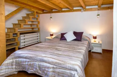Letto o letti in una camera di In Centro Da Rox e Manu LT - PMS CaseVacanze