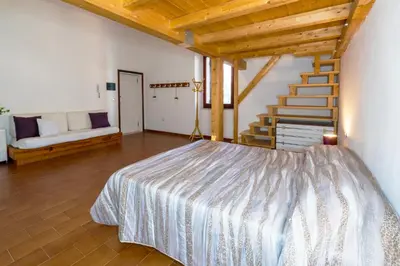 Letto o letti in una camera di In Centro Da Rox e Manu LT - PMS CaseVacanze