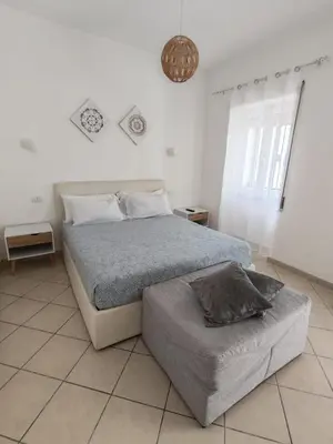 Letto o letti in una camera di Olbia City House