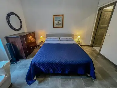 Letto o letti in una camera di Casa Vacanze da Anna e Turi